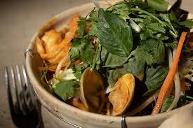 Gunther and Co. signature dishes Dishes from the wood-fired grill, Oven Roasted Oysters, Duck Confit Potstickers, Thai Seafood Hot Pot.